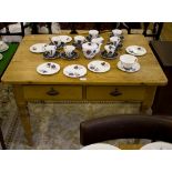 An Edwardian pine kitchen table, with two frieze drawers on turned tapering legs, 111cm wide