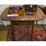 A George III mahogany Pembroke table, with boxwood and ebony stringing on square tapering legs and