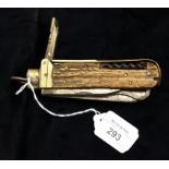 A Victorian coachman's pocket knife with attendant brass whistle