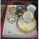 A collection of four silver holders and one silver plated holder and a Paragon coffee can and saucer