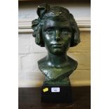 After Newbury A Trent Plaster bust of a girl, signed and dated 1934 on a wooden base