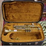 A Corton brass trumpet, no. 705908 with travel case