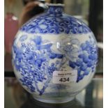 A Japanese blue and white Arita bottle vase with floral decoration, 16cm high