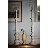 Two painted wood table lamps with fluted and acanthus carved stems, 61cm high and an alabaster table