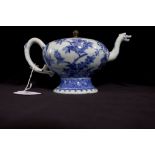 A Chinese blue and white teapot of pedestal form, with floral decoration and dragon spout, R&G