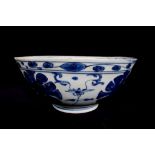 Wanli Shipwreck: A Chinese blue and white bowl, with flowerhead pattern, 22cm diameter, Nanhai