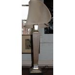 A table lamp, of square tapering form with crazed silver finish