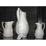 Three Portmerion Parian jugs with various moulded decoration