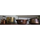 A copper cauldron, with swing handle 28cm diameter, a two handled copper pan, a copper kettle and