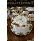 A Royal Albert part dinner and tea service, Old English Rose pattern, including cake stand and