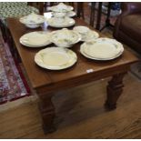 A quarter veneered oak coffee table, with square baluster legs, 117cm wide