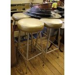 Four chrome bar stools and a Lloyd Loom laundry basket