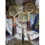 A vintage collection of nine rackets, including six tennis (Maxply McEnroe-Dunlop) Slazenger, etc,