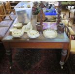 A large Victorian mahogany library table, the inset rectangular top over four frieze drawers on