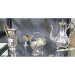 A collection of silver plate to include water jug, small baskets, etc