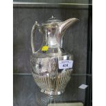 A silver plated water jug