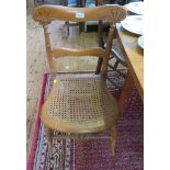 Two late Victorian beech bedroom chairs, both with cane seats