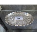 A silver oval pin tray with fluted edge and wavy line decoration, Birmingham 1890