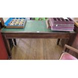 A 1920's mahogany side table, the linoleum inset top over two frieze drawers on square section