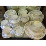 A Colclough Braganza pattern part dinner service with blue floral pattern and another with