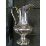 A fine example of a silver plated wine jug, with chased decoration