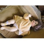 A Franz Schmidt doll, no. 55, with open grey eyes, open mouth, later wig and body, and another