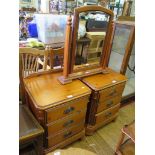 A pair of stained pine bedside drawers by Ducal Ltd - Chateau series, each with three drawers on