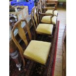 A set of six Queen Anne style walnut dining chairs, with vase shape splats, drop in seats and