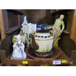 A pair of continental figures, a Royal Doulton character jug of a barrister (cracked) and various