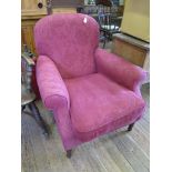 A pair of upholstered armchairs, with stained wood turned legs and scroll arms (2)