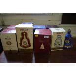 Eight Wade commemorative bell form bottles of Bell's whisky in original boxes (8)