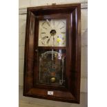 An American mahogany cased wall clock, with printed glass door, and painted dial, the twin train