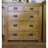 An oak chest of two short and three long drawers 97.5cm wide, 103cm high