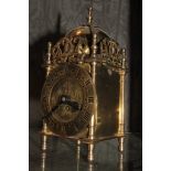 A Smiths brass timepiece in the form of a lantern clock, 17.5cm high