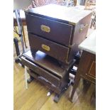 A pair of low side tables, with vine carved drawers enclosing wine glasses over a wine rack, 53cm