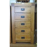 An oak chest of five short drawers 60cm wide, 109cm high