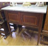 An Edwardian marble top washstand, with raised back, inlaid panelled doors and square section