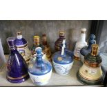 Seven Wade commemorative bell form decanters of Bell's whisky and three commemorative bottles of