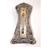 A silver mounted thermometer