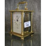 A good brass cased carriage clock by Rapport-London, 15cm high (key inside case)