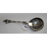 A Victorian silver sifter spoon with a cast cavalier knop, 17.5cm long