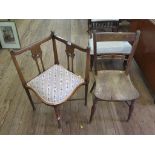 An Edwardian walnut and boxwood strung corner chair with pierced splats, overstuffed seats and
