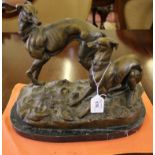 A bronze figure of two greyhounds playing, in the style of P.J. Mene, on a marble base, 28cm high