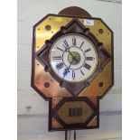 A brass and mahogany cased drop dial clock, the 19th century dial and movement with alarm dial,