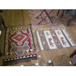 An antique Kilim prayer rug, with stylised floral tree on red ground surrounded by two deep