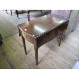 A mahogany Pembroke table, by Strongbow furniture, the shaped top and leaves over a frieze drawer on