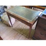 An Edwardian mahogany and satinwood crossbanded ladies writing table, the leather inset top over a