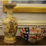 A Meiji style Imari moulded bowl with floral panels 24.5cm diameter and a Satsuma vase of baluster