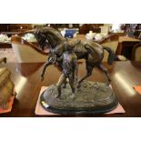 A bronze figure of a horse and jockey, signed Edgar Bertram 1872, on a marble base, 47cm high