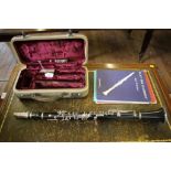 A clarinet 'The Model 41' by Lewington, London, numbered Q23609 with fitted case 68cm, and three